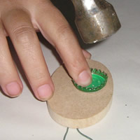 hammering bottle top